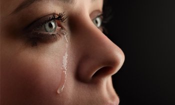 Woman with tears in her eyes